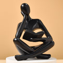 Escultura Pensador com Livro